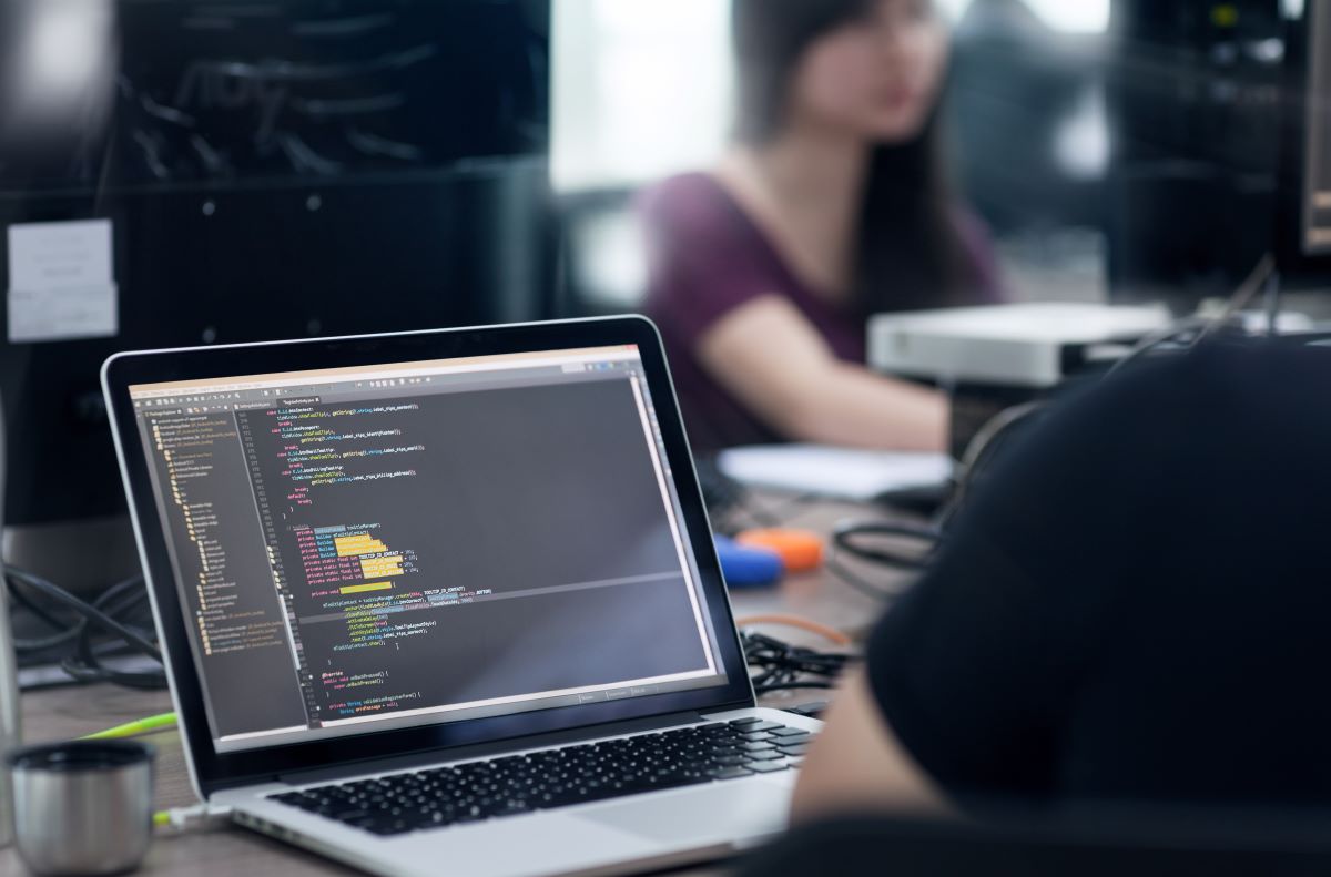 coding on laptop